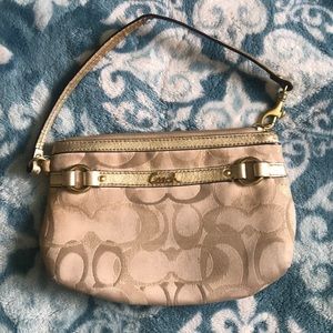Coach metallic Signature Wristlet (pre-loved)